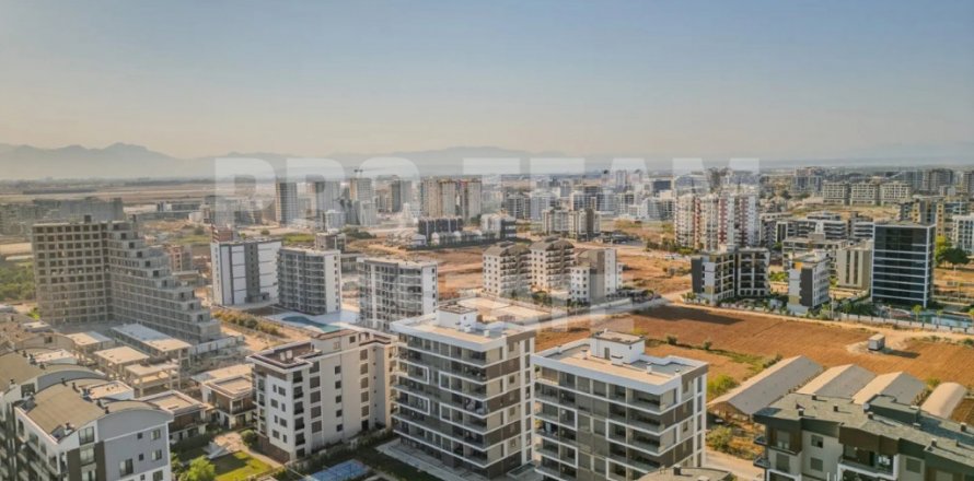 Квартира  2-х ком. в Алтынташа, Анталья, Турция №211362